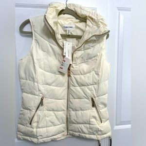 Calvin Klein white sleeves less vest.